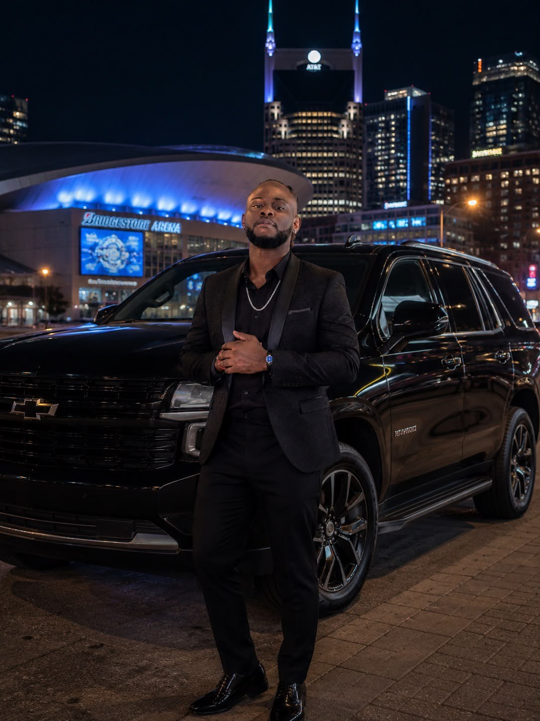 Sondy Black Car chauffeur with the black Suburban in downtown Nashville